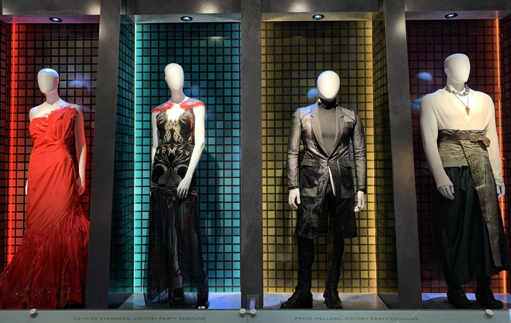 Costumes that were worn by the cast of the Hunger Games movies are on display as part of the Hu ...