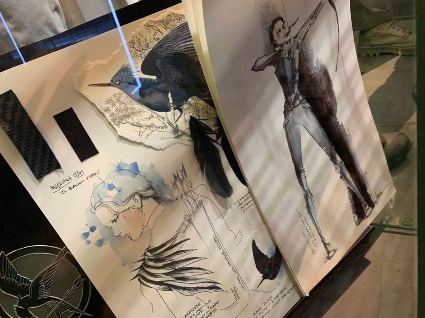 The sketchbook prop used by Lenny Kravitz in the Hunger games is on display as part of the Hung ...