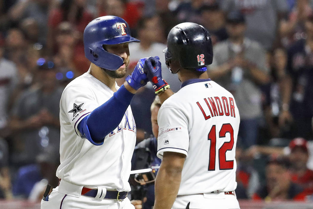 American League's Joey Gallo, left, of the Texas Rangers, is congratulated by American League t ...