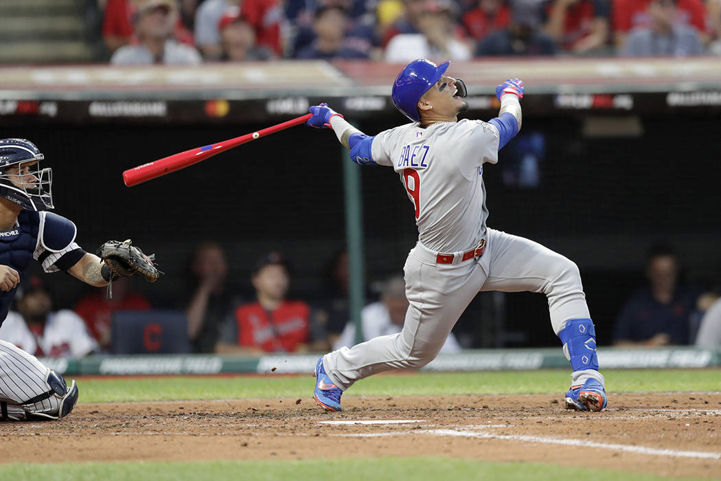 National League Javier Baez, of the Chicago Cubs, reacts as he pops out during the during the t ...