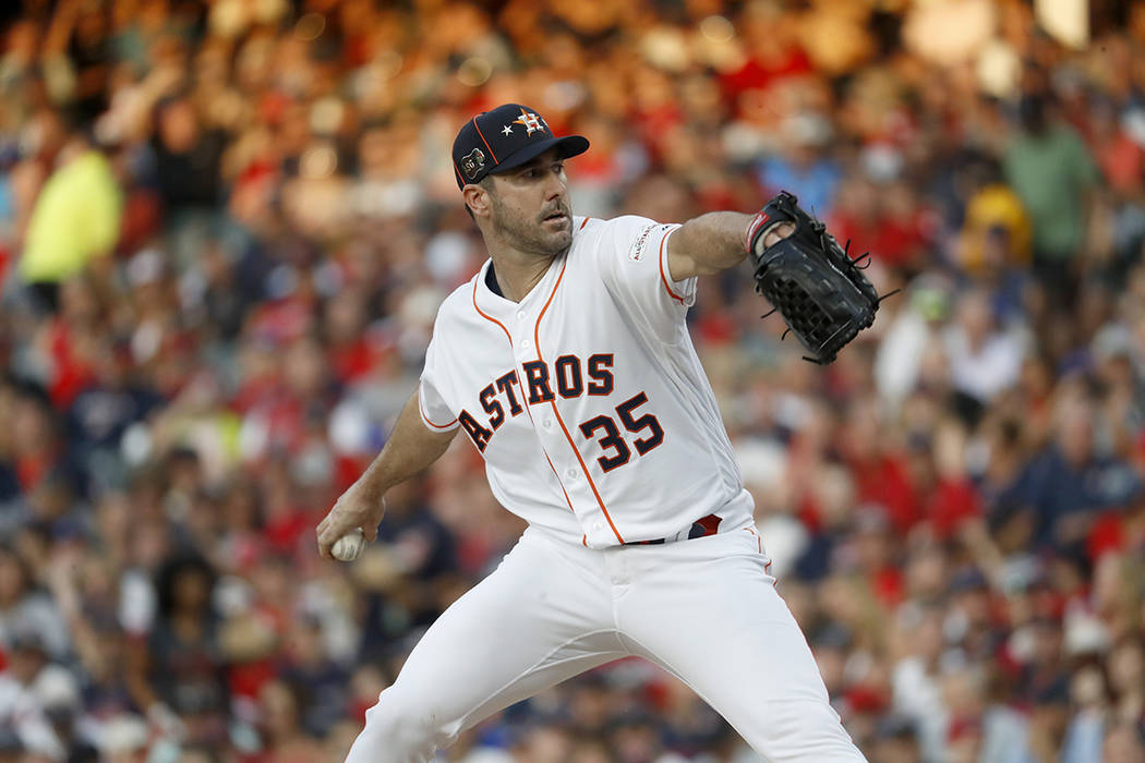 American League starting pitcher Justin Verlander, of the Houston Astros, throws during the fir ...