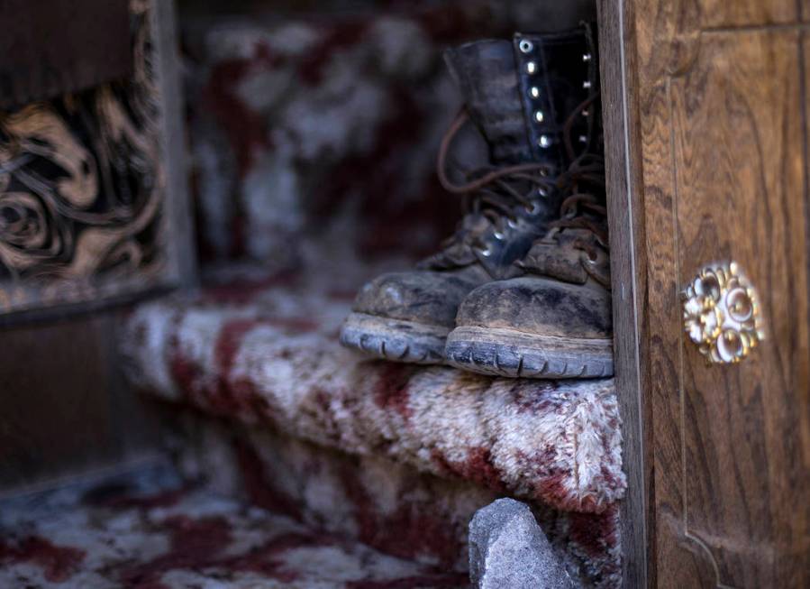 Boots in the trailer on the property where Troy Ray died as a result of the July 4 earthquake w ...