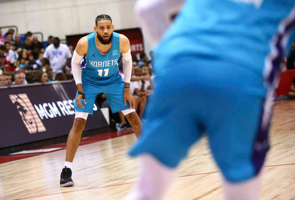 Charlotte Hornets' Cody Martin (11) looks on during the second half of a basketball game agains ...