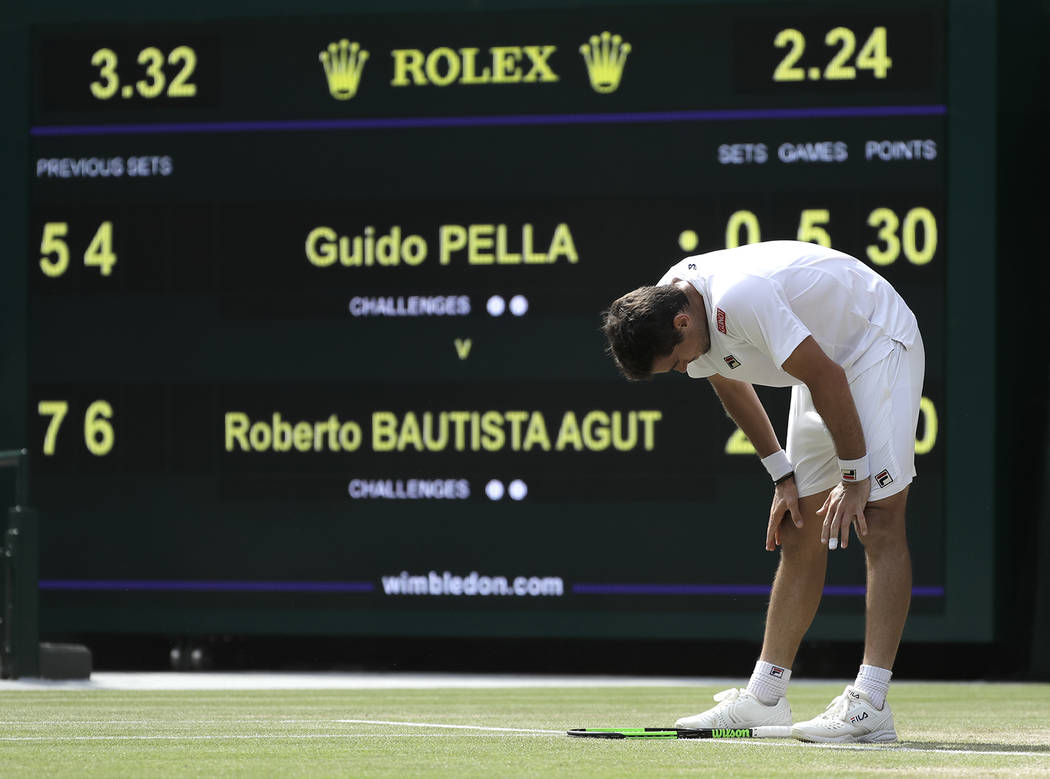 Argentina's Guido Pella is dejected after losing a point during a men's quarterfinal match agai ...