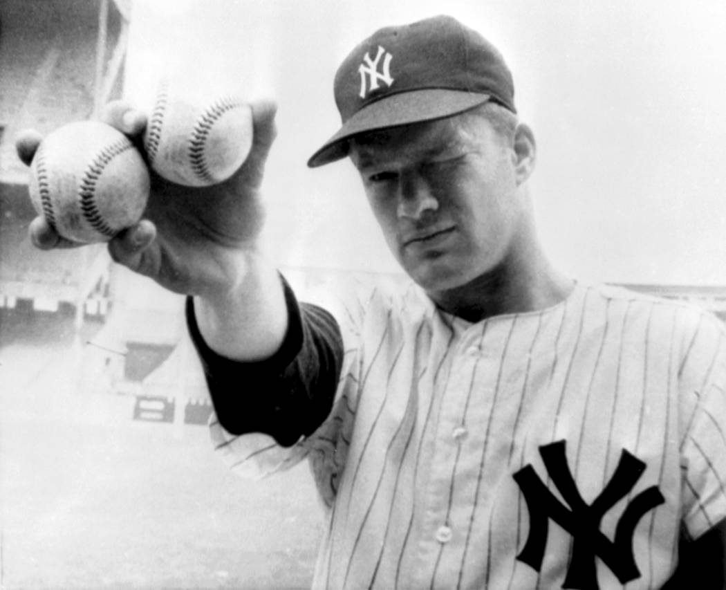 FILE - In this Oct. 14, 1964 file photo, New York Yankees pitcher Jim Bouton takes aim as he ho ...
