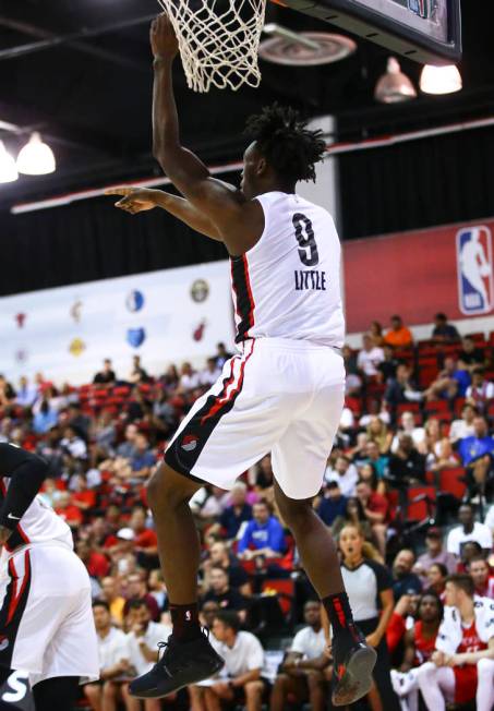 Portland Trail Blazers' Nassir Little (9) dunks against the Houston Rockets during the first ha ...