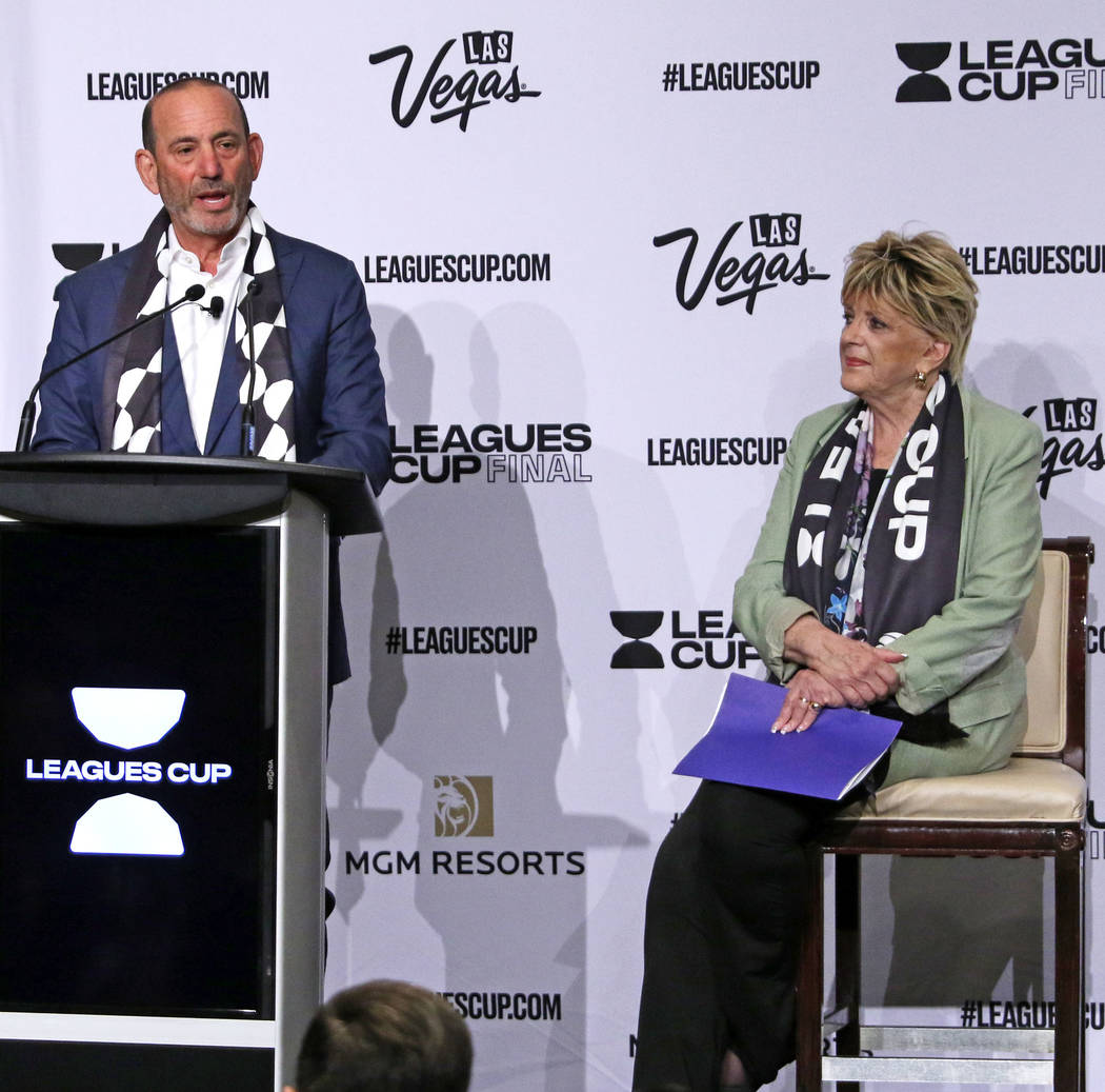Major League Soccer Commissioner Don Garber, left, announces the Liga MX-MLS Leagues Cup Final ...