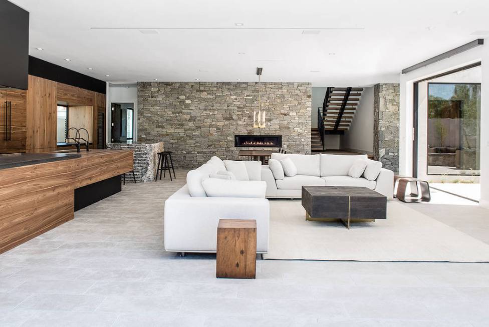 The great room opens to the pool area. (Jewel Homes)