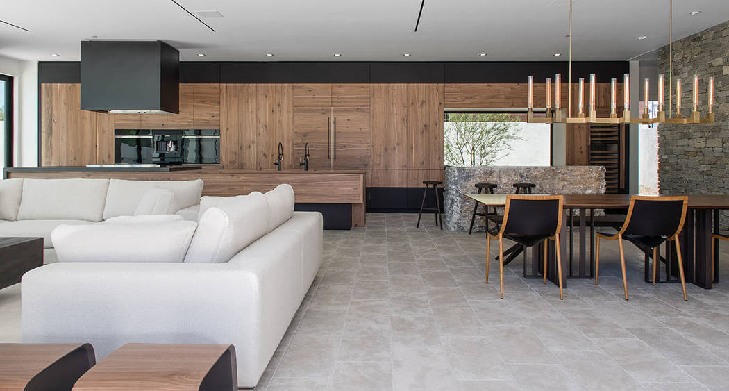 The kitchen, dining area and great room connect in an open floor plan. (Jewel Homes)