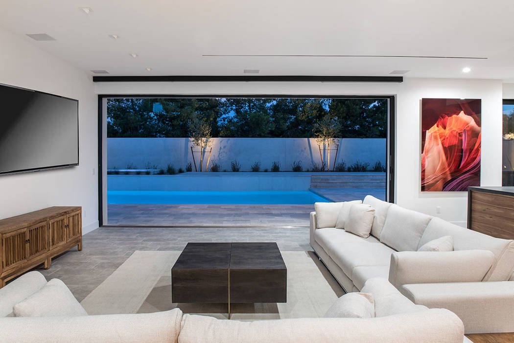 The great room opens to the pool area. (Jewel Homes)