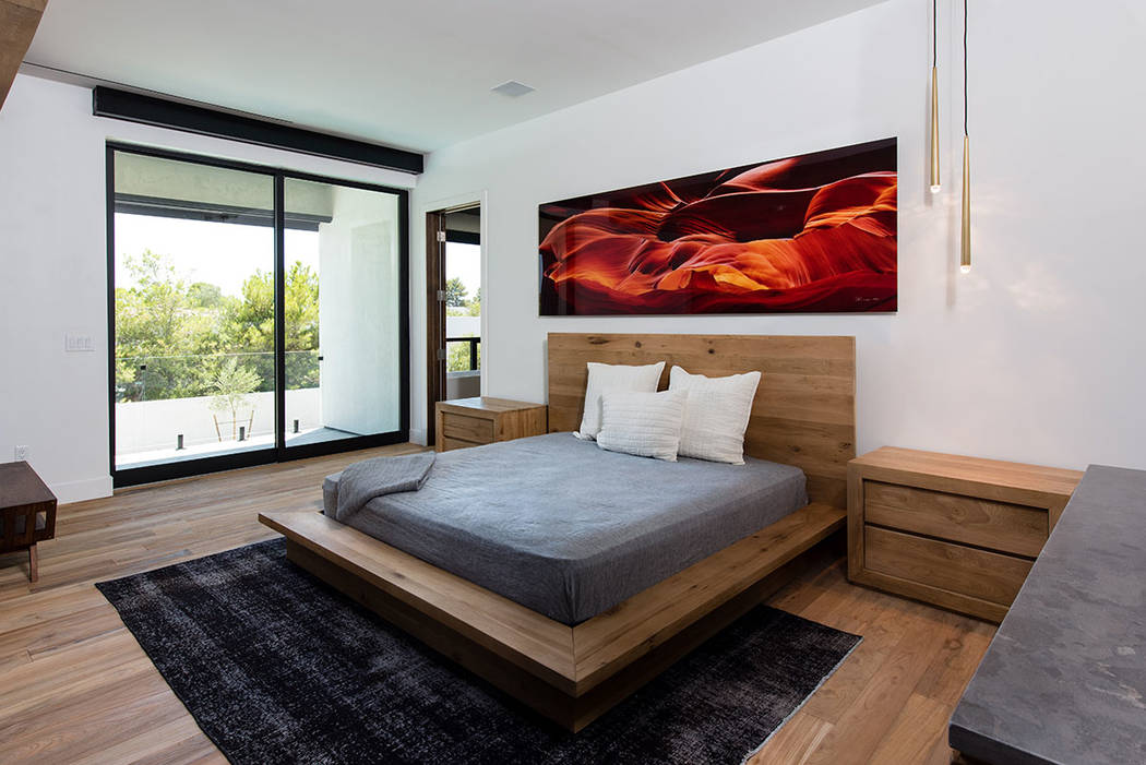 Jewel Homes The master bedroom features photographer Peter Lik's work.