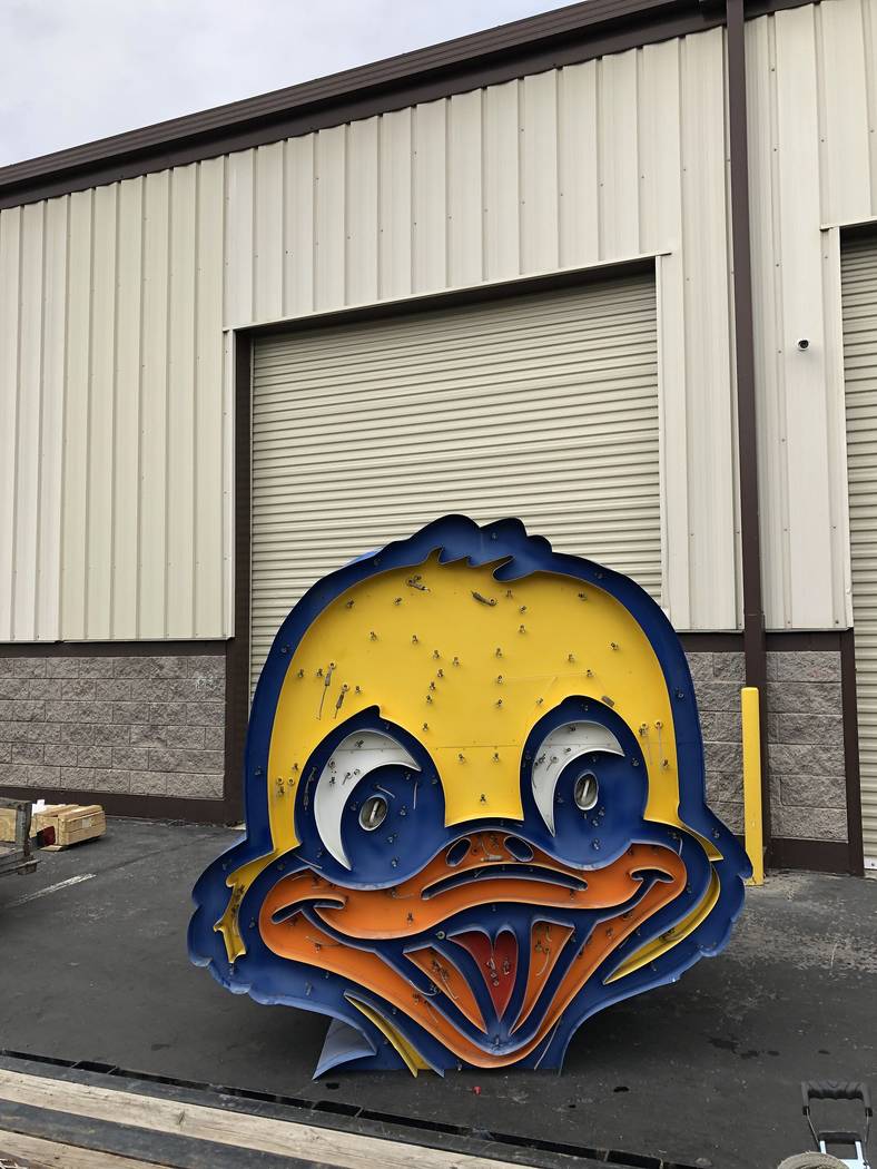 The Ugly Duckling neon sign undergoes a transformation. (The Vox Agency)
