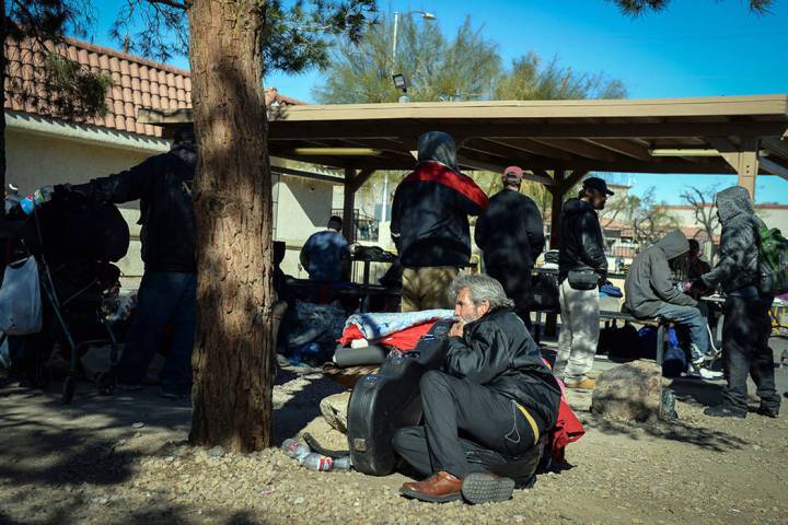 Clients relax at the city of Las Vegas' homeless courtyard in Las Vegas, Thursday, Jan. 24, 201 ...