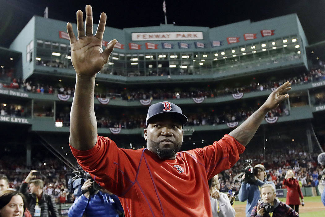 FILE - In this Oct. 10, 2016, file photo, Boston Red Sox's David Ortiz waves from the field at ...