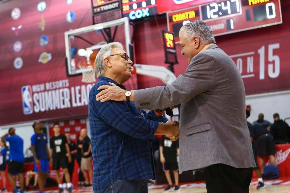 Warren LeGarie, executive director of the Vegas Summer League, left, talks with Gov. Steve Siso ...