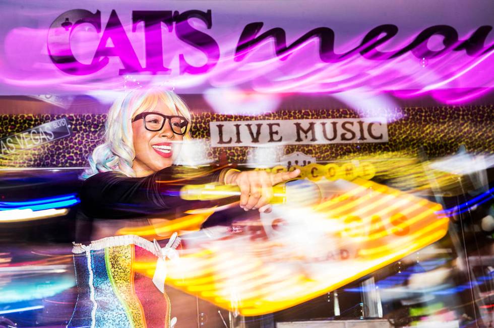 MC Primrose Martin fires up the crowd at Cat's Meow karaoke club on Friday, July 12, 2019, at N ...