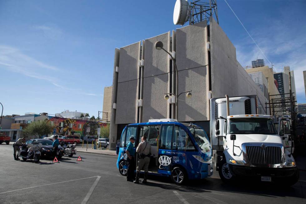 The scene of an accident between a truck and a driverless electric shuttle near Fremont Street ...