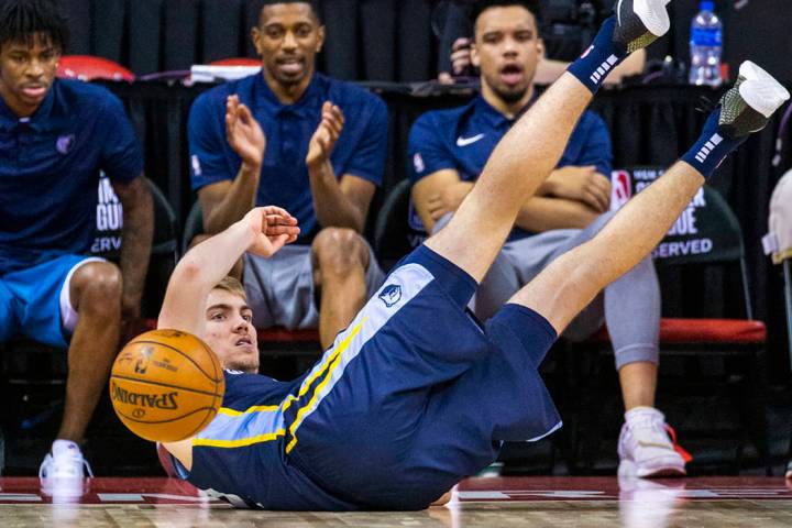 Memphis Grizzlies forward Peyton Aldridge loses the ball after a rebound attempt versus the Bos ...