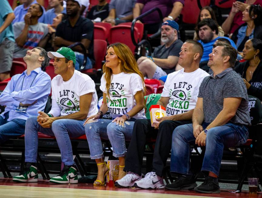 Fans of Boston Celtics center Tacko Fall wear t-shirts in his honor while watching them face th ...