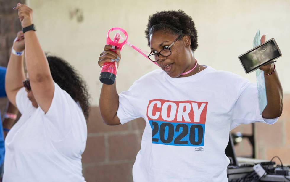 ShaRhonda Ramos, right, an organizer for democratic presidential candidate Sen. Cory Booker, D- ...