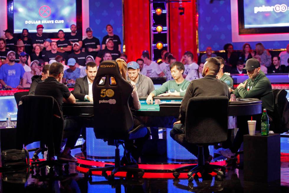 The main event final table of nine players during the World Series of Poker at the Rio hotel-ca ...