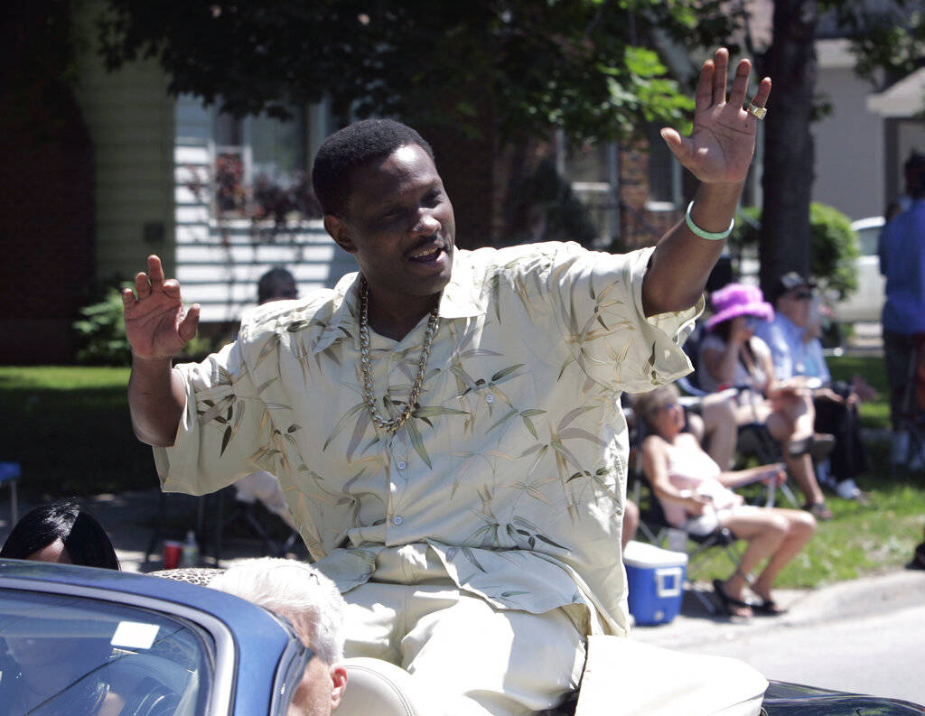 In a June 10, 2007, file photo, Pernell Whitaker waves to the crowd during a parade before he w ...