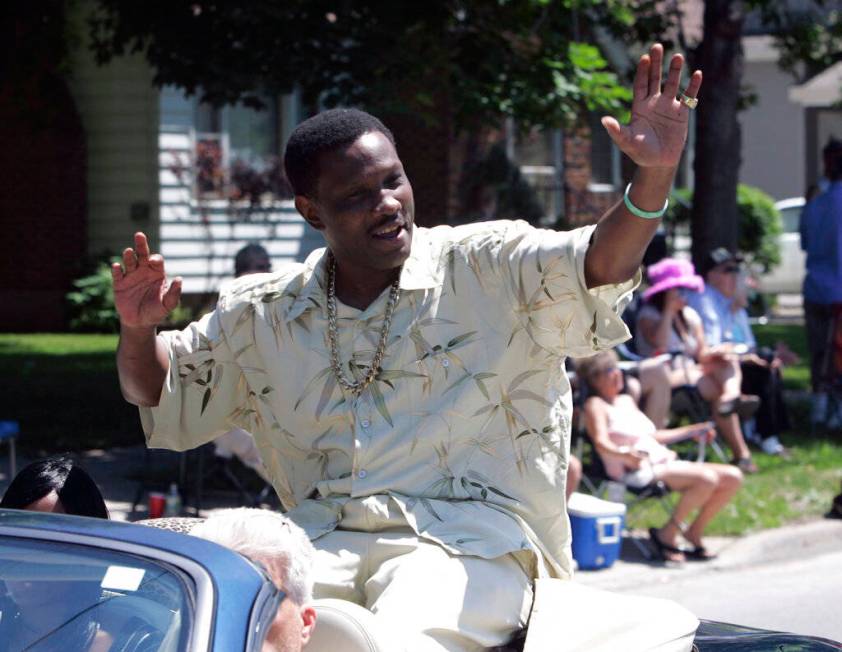 In a June 10, 2007, file photo, Pernell Whitaker waves to the crowd during a parade before he w ...