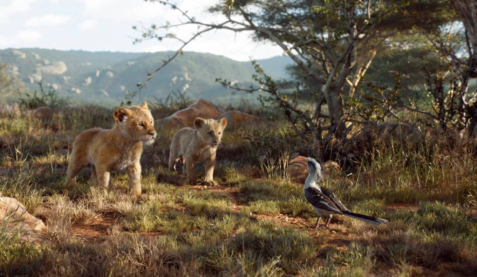 This image released by Disney shows, from left, young Simba, voiced by JD McCrary, young Nala, ...