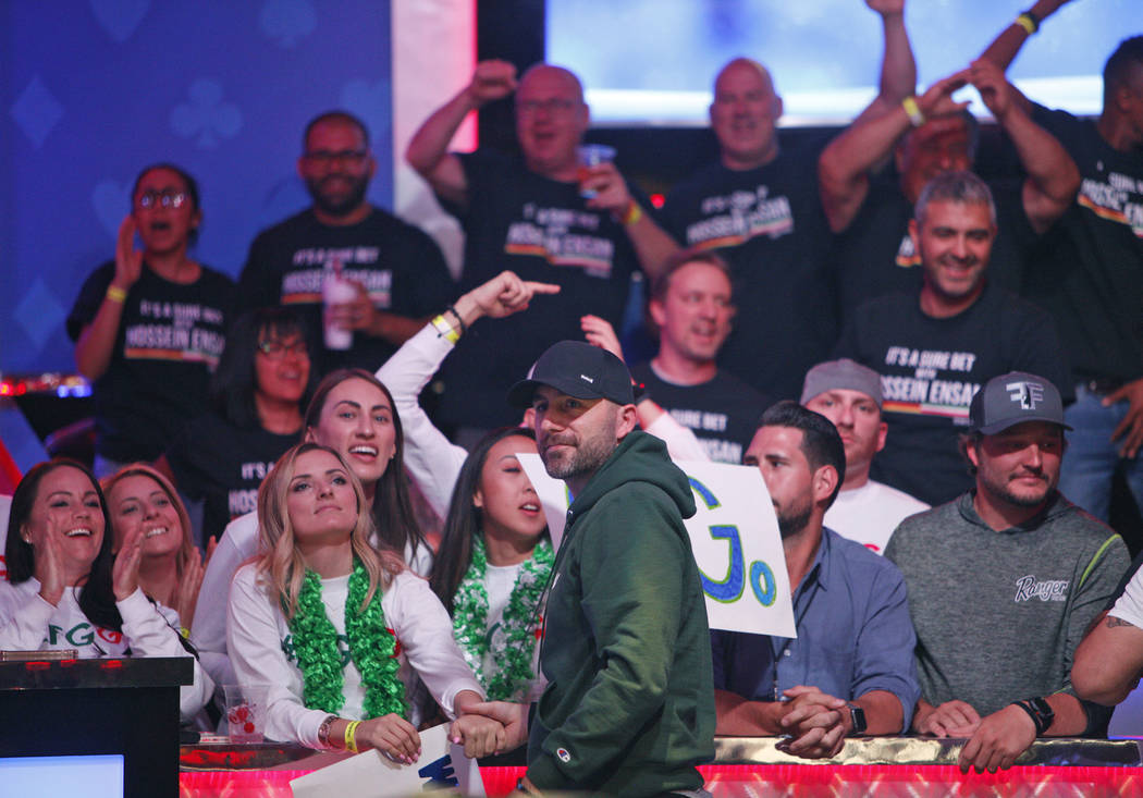 Gary Gates greets his friends and family during a break on the second day of the main event fin ...