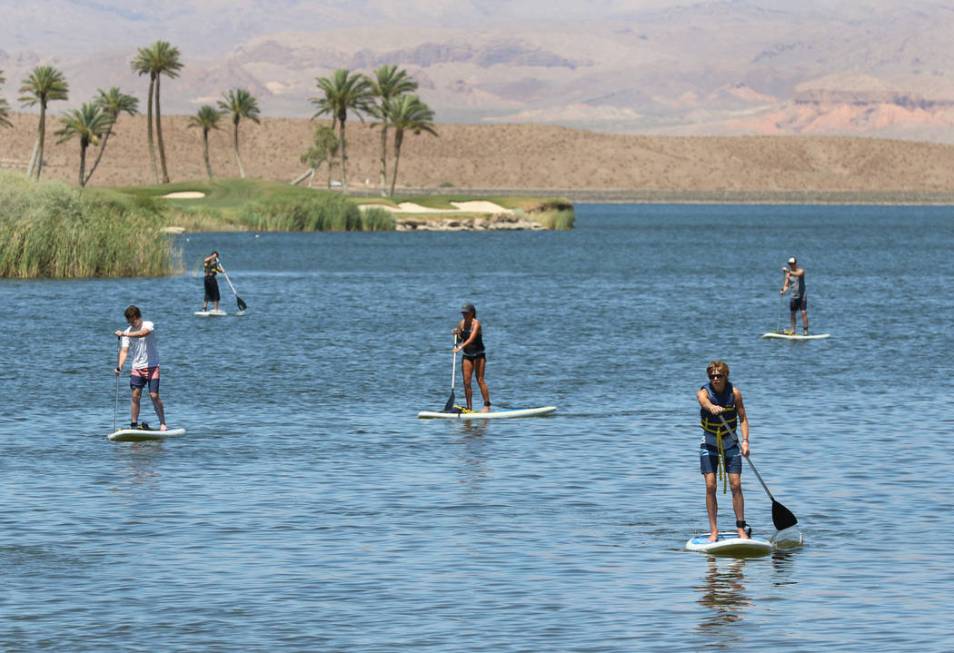 Laine Neunreiter, center, and her husband Aaron, far right, of Salt Lake City, take advantage o ...