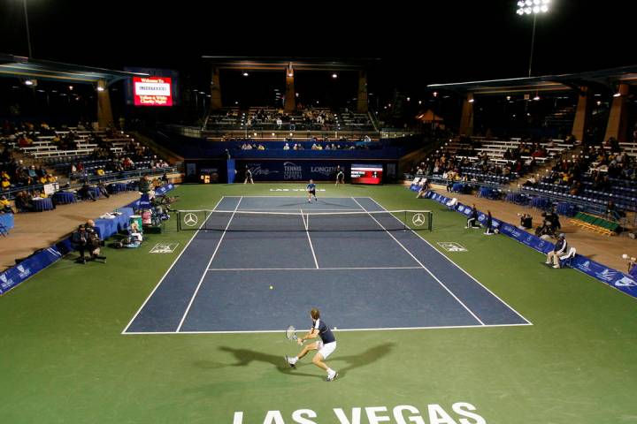 Julien Benneteau, of France, hits a return versus Lleyton Hewitt, of Australia, during the seco ...