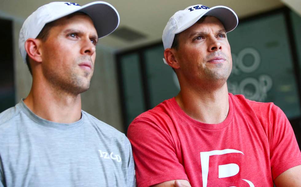 Mike Bryan, left, and Bob Bryan talk about Cherrial Odell, a local amatuer tennis player that t ...