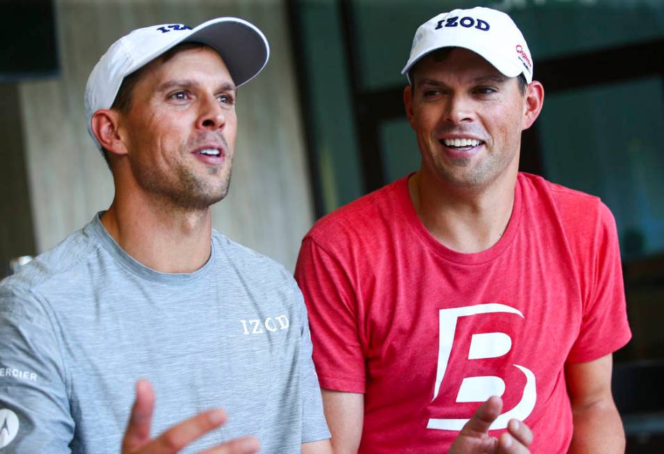 Mike Bryan, left, and Bob Bryan talk about Cherrial Odell, a local amatuer tennis player that t ...