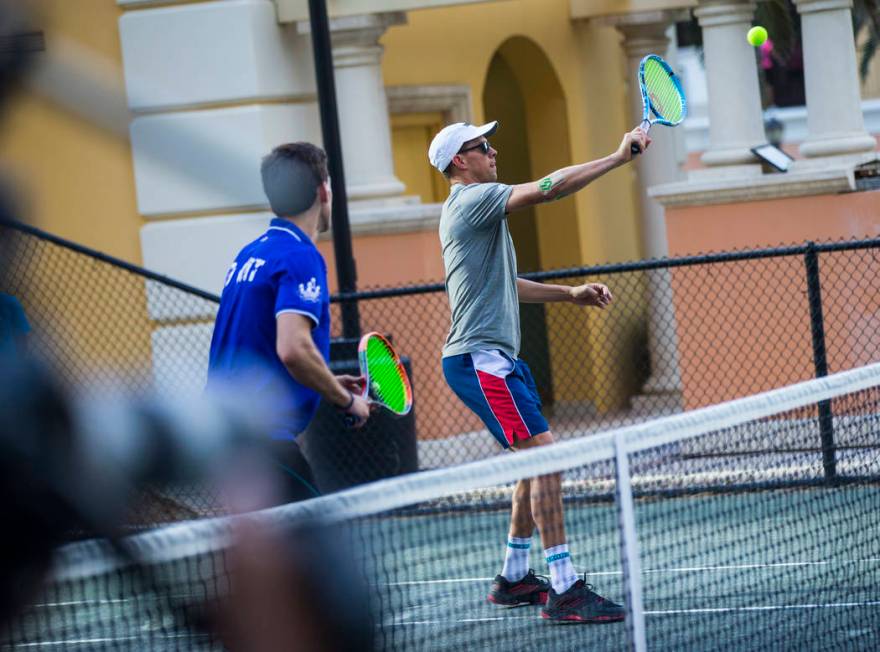 Mike Bryan helps lead a tennis clinic held at the Stirling Club at Turnberry Place in Las Vegas ...