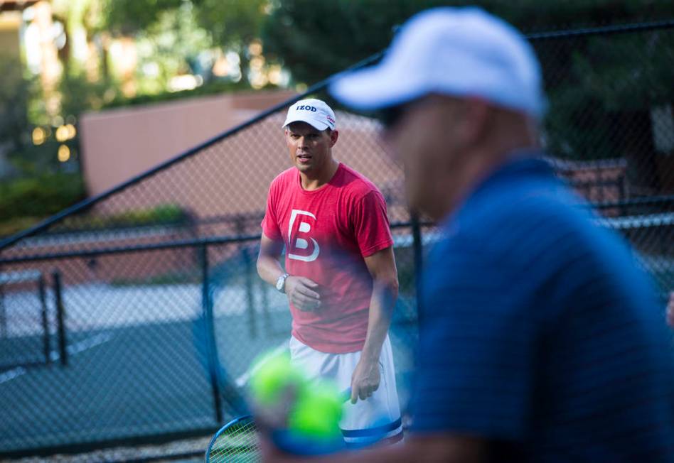 Bob Bryan helps lead a tennis clinic held at the Stirling Club at Turnberry Place in Las Vegas ...