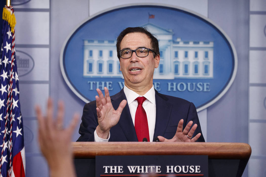 Treasury Secretary Steve Mnuchin speaks during a news briefing at the White House, in Washingto ...