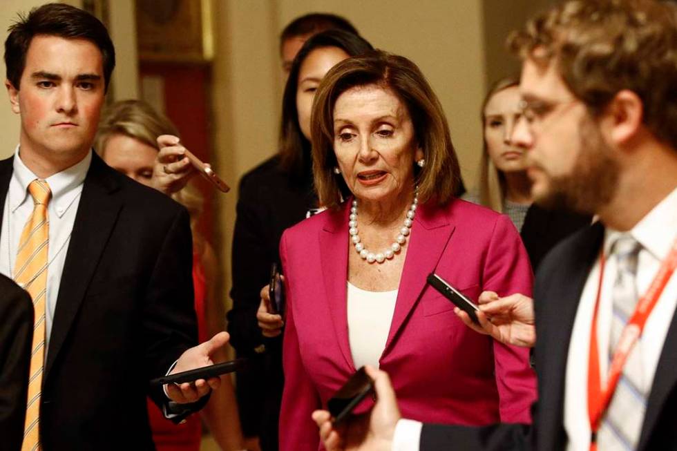 House Speaker Nancy Pelosi, D-Calif., walks to the House Chamber, Tuesday, July 16, 2019, on Ca ...