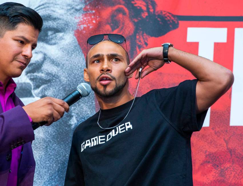 Emcee Ray Flores, left, interviews Boxer Keith Thurman during his grand arrival to the MGM Gran ...