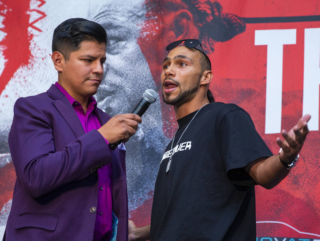 Emcee Ray Flores, left, interviews Boxer Keith Thurman during his grand arrival to the MGM Gran ...