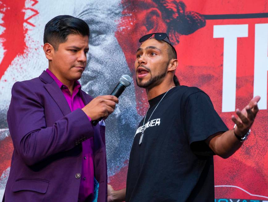 Emcee Ray Flores, left, interviews Boxer Keith Thurman during his grand arrival to the MGM Gran ...