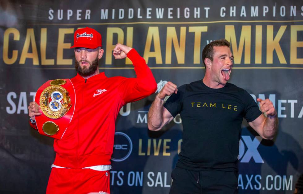 Boxers Caleb Plant, left, and Mike Lee pose for the fans during fighter grand arrivals at the M ...