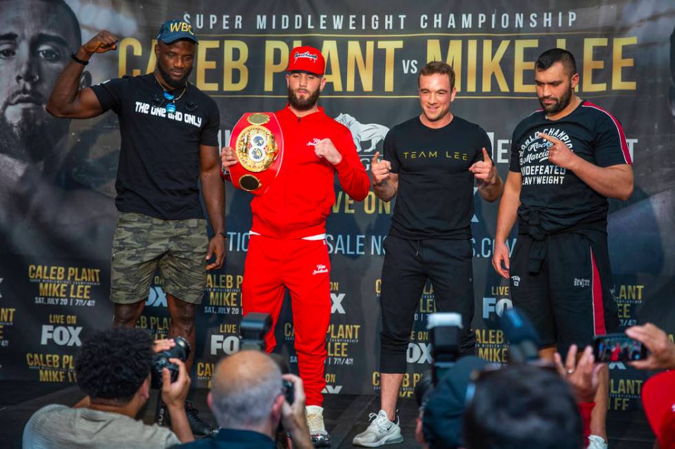 Boxers Efe Ajaba, from left, Caleb Plant, Mike Lee and Eren Demirezen pose for the fans on the ...