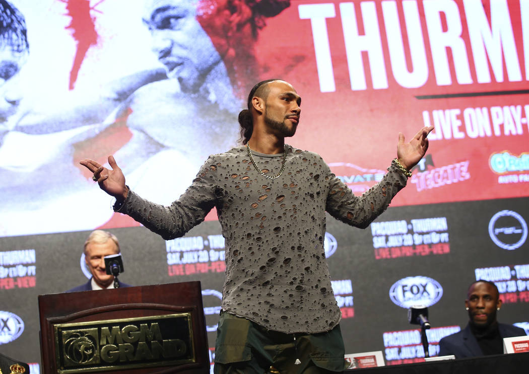 Keith Thurman poses for pictures during a press conference ahead of his WBA welterweight champi ...