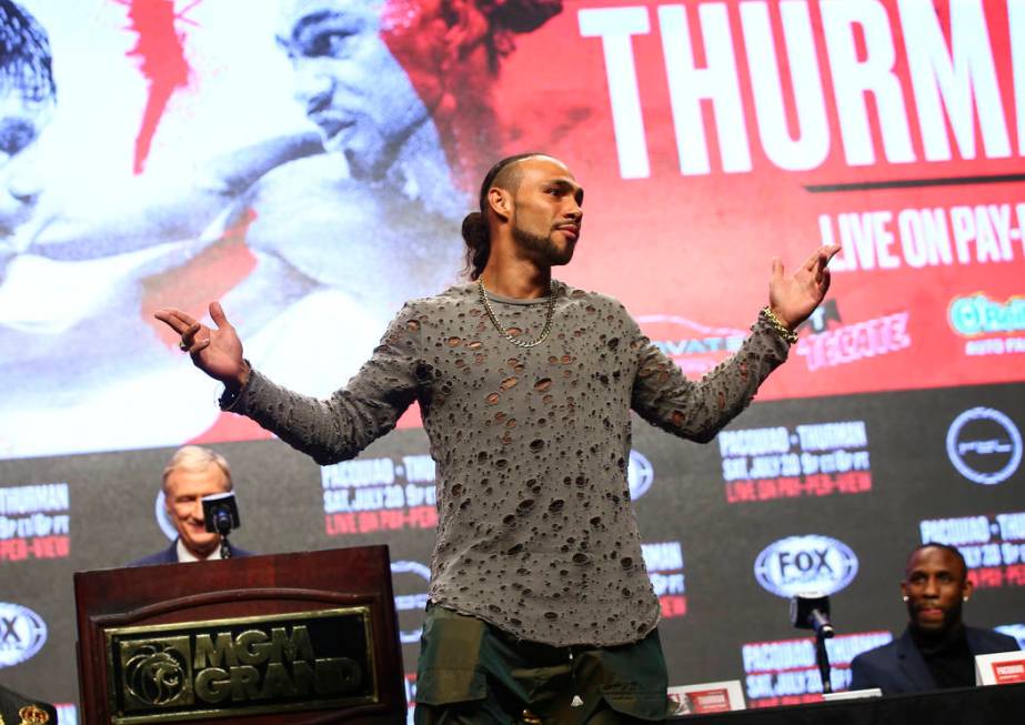 Keith Thurman poses for pictures during a press conference ahead of his WBA welterweight champi ...