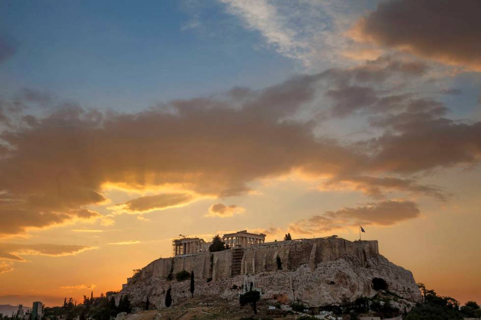 In this file photo dated June 27, 2015, the ancient Acropolis hill, with the ruins of the fifth ...