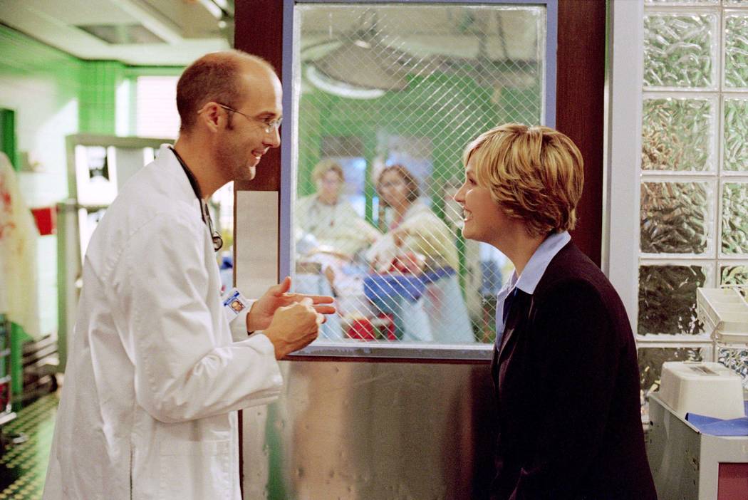 Anthony Edwards stars as Dr. Mark Greene and Sherry Stringfield as Dr. Susan Lewis in "ER." (Wa ...