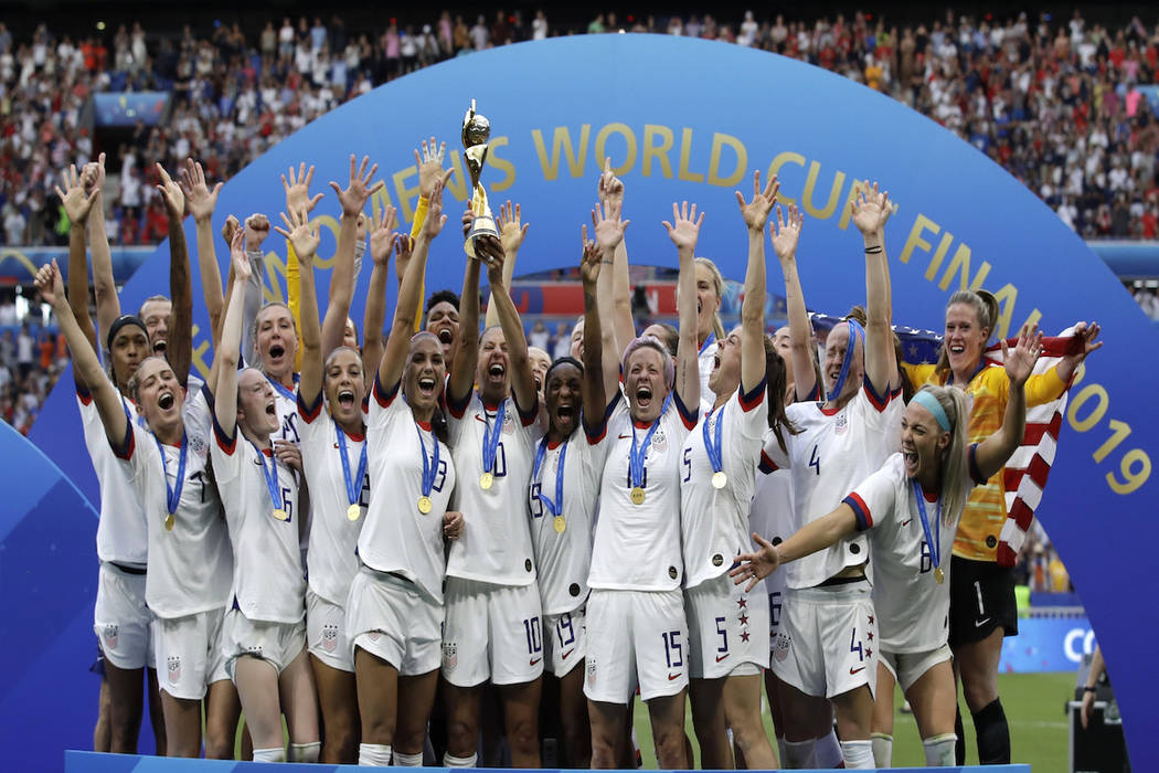 United States' team celebrates with trophy after winning the Women's World Cup final soccer mat ...