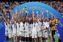 United States' team celebrates with trophy after winning the Women's World Cup final soccer mat ...