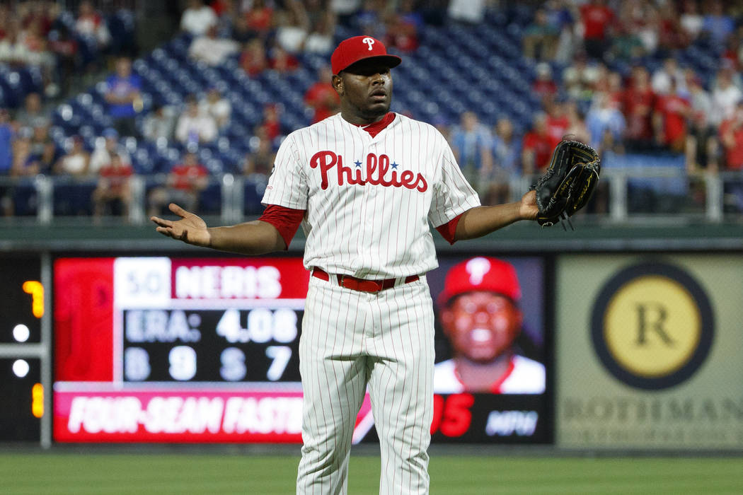 Philadelphia Phillies relief pitcher Hector Neris reacts after he was ejected for hitting Los A ...