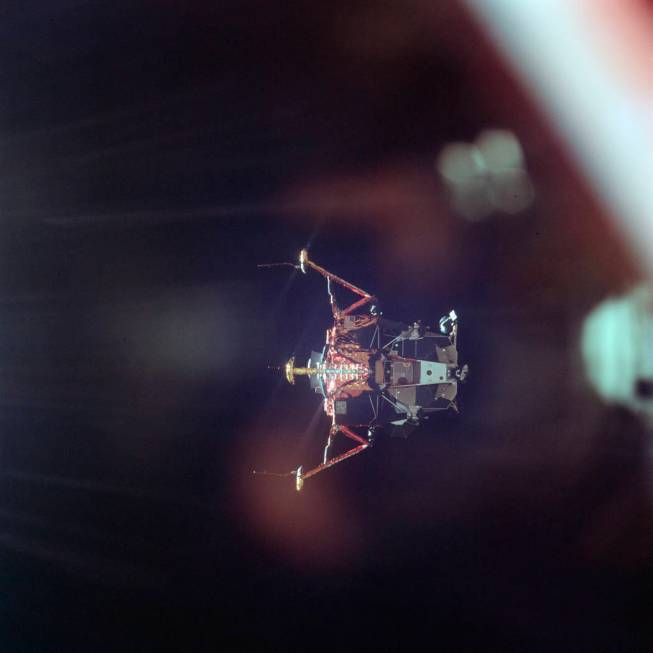 In this July 20, 1969 photo made available by NASA, the Apollo 11 Lunar Module undocks from the ...